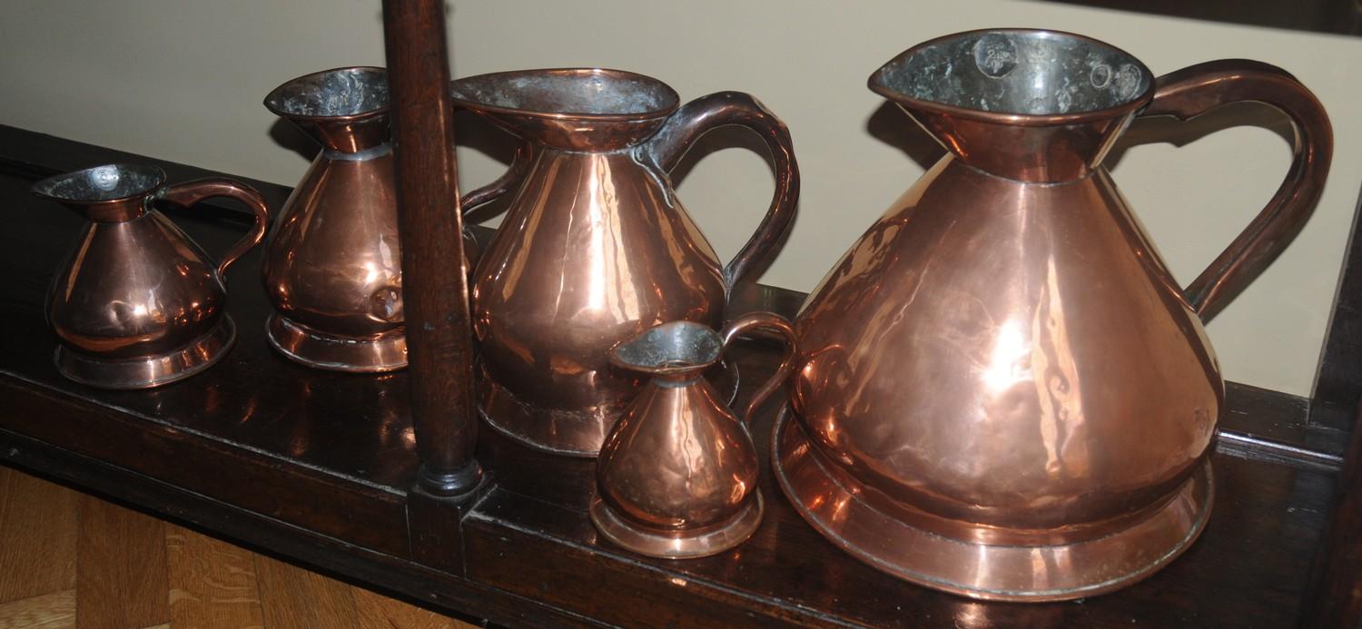 A graduated set of five Victorian copper hay stack measures, 32cm x 14cm, c.1850