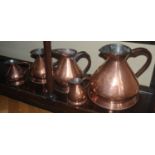 A graduated set of five Victorian copper hay stack measures, 32cm x 14cm, c.1850