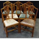 A set of five Hepplewhite design oak dining side chairs; another two, similar (7)