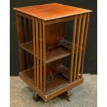 An Edwardian mahogany revolving bookcase.