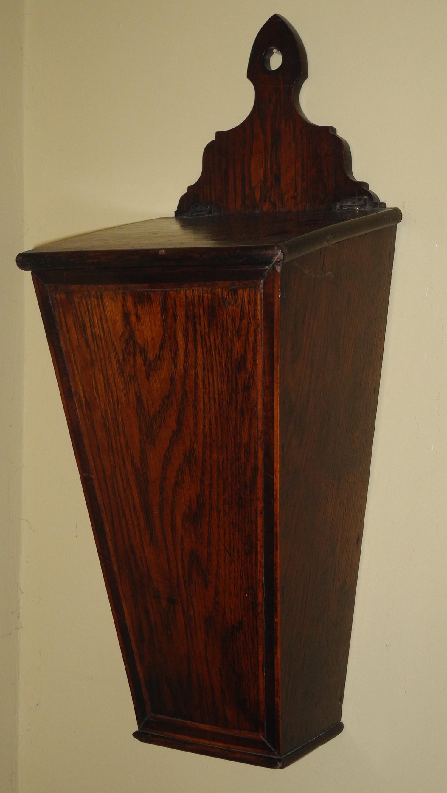 A mid 19th century oak tapering candle box, sloping hinged cover, 51cm high, c.1850 - Image 2 of 2