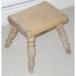 A rustic rectangular milking stool, turned legs, early 20th century