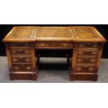 A reproduction mahogany partners style desk, leather inlaid top, long drawer over kneehole