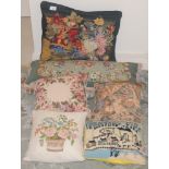 A woolwork tapestry cushion, embroidered with flowers; others (4)