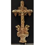 A cast iron Corpus Christi, The Messiah with two praying angels at his feet. 134cm high.