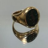 A 9ct gold signet ring, set with an oval blood stone, size J, 4.9g gross