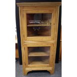 A pine floor standing two door corner display cabinet, shelved interior, 179cm x 90cm