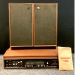 A Vintage Dynatron Cavalcade SRX30D music center, Goldrig G102 belt drive turntable, and speakers