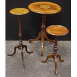 A Victorian mahogany wine table, satinwood inlaid star cartouche, turned column, cabriole legs;