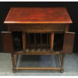 An oak cased Columbia Viva Tonal Grafonola Gramophone, panelled case, barley twist supports united