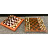 Games - an Egyptian Pharaohs chess set, height of king 78mm, fitted board case; another as Fantasy