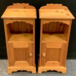 A pair of pine bedside cabinets, open shelf above panelled door (2)