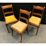 Three marquetry mahogany dining chairs.