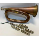 An early 20th century Metropolitan Policeman's whistle, others, similar; copper and brass bugle, qty