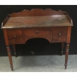 A Victorian mahogany dressing table, shaped three quarter gallery, long drawer over kneehole flanked