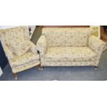 A 1930/40' drop arm two seat sofa; a conforming wingback armchair (2)