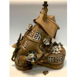 Studio pottery - A Penally Pottery shoe house, signed P A Day. 45cm high x 42 cm wide.