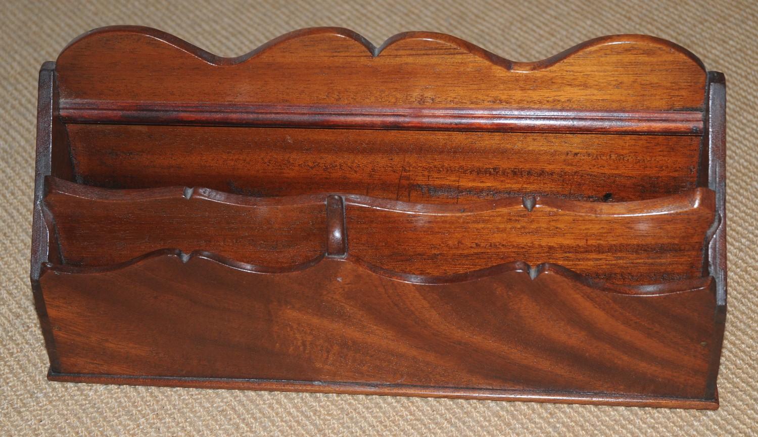 A 19th century mahogany waterfall stationery letter rack, 36cm wide, c.1880