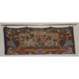 A Victorian woolwork tapestry, embroidered with birds, 70cm wide, 33cm high, c.1870