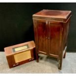 An Edwardian mahogany two door music cabinet, side action fitted interior, 38.5cm x 92cm; a