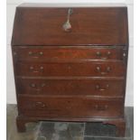 A George III mahogany bureau, the fall front over four long graduated drawers, brass swan neck