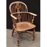 An elm Windsor chair.