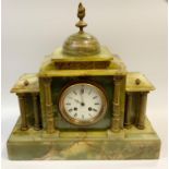 An onyx mantel clock by Japy Freres retailed through Bennetts of London