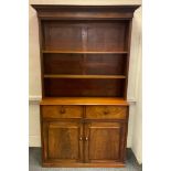 A Victorian mahogany bookcase cabinet, open shelving over two drawers and two door cupboard.