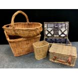 An oval ended wicker and bamboo trug, large log basket, four person picnic basket etc (5)