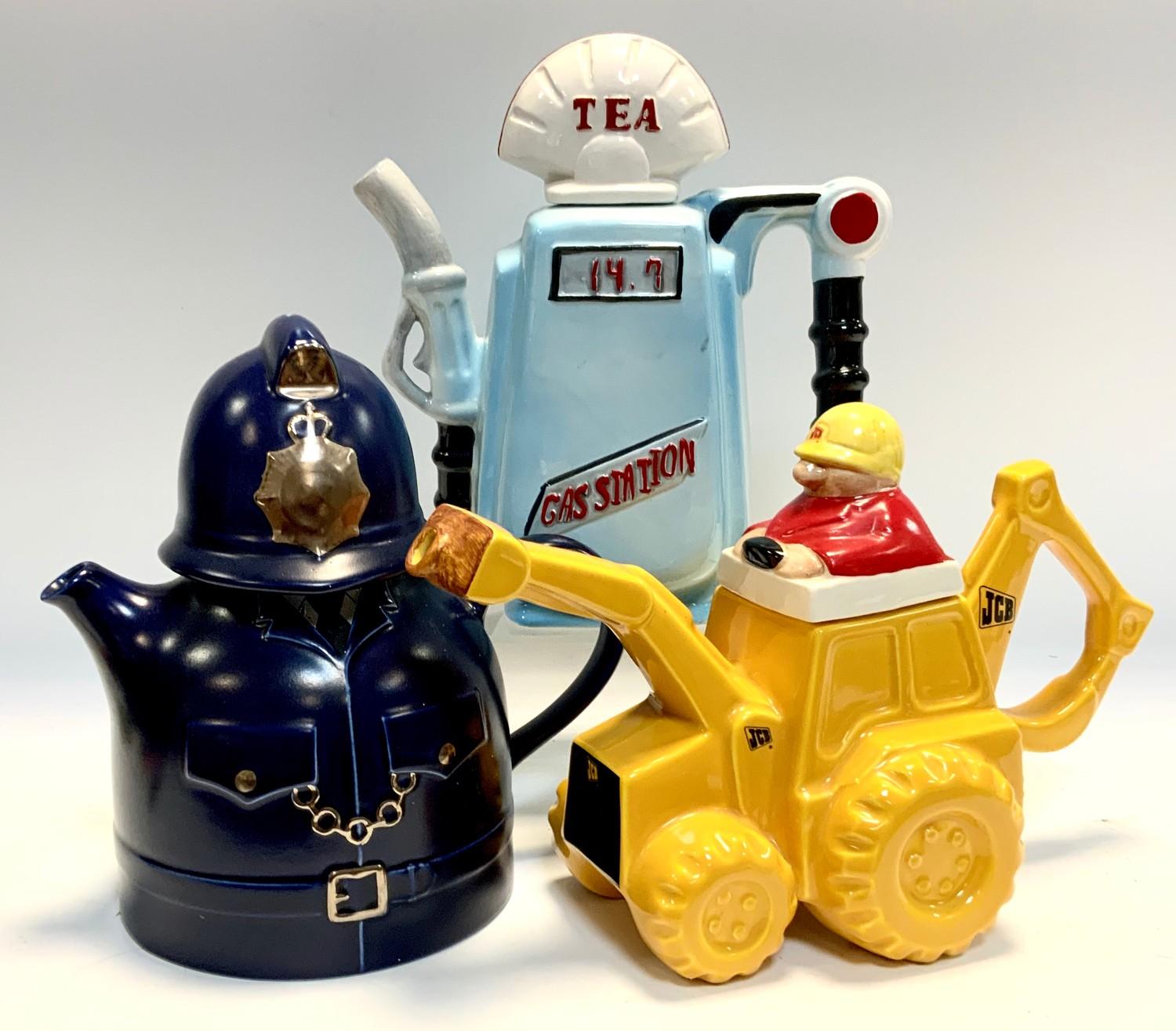 A novelty Carltonware style teapot as a JCB, others, S. Fieldings & Co Policeman, etc (3)