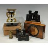A Victorian graphoscope; a pair of Karl Zeiss Jena binoculars; a GPO postal scales balance.