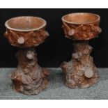 A pair of late Victorian stoneware planters/jardiniere and stands, each naturalistically modelled as