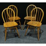 A set of four elm dining/side chairs, hooped backs, saddle seats(4)