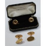 A pair of 18ct gold cuff links, 12g; a pair of 9ct gold collar studs, 2g