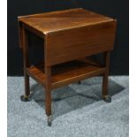 A mahogany butlers serving trolley.