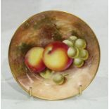 A Royal Worcester circular pin dish, painted with ripe fruit on a mossy ground, 10cm diameter