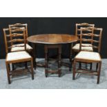 A set of four 20th century oak dining chairs, ladder backs, drop-in seats; oak gateleg table, oval