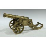 An 18th century style brass model cannon, 45cm long