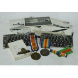 Militaria - a pair of WWI medals, 246518 Pte.2 EL Fielden RAF; a brass cap badge; two accompanying