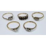 A gold diamond solitaire ring, marks rubbed, probably 18ct and platinum, 2.1g; an 18ct gold and