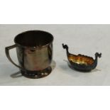 A silver christening mug, Sheffield 1943, 3.5oz; a miniature 925 sterling silver Viking longship,