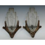 A pair of Art Deco frosted glass fan shaped wall sconces, moulded with dancing female figures in a