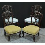 A pair of late Victorian/Edwardian mahogany dining side chairs, Chinese Chippendale inspired;