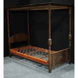 An early 20th century oak four-poster single bed, c.1930