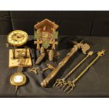 A cuckoo clock; clock parts; toast forks; etc