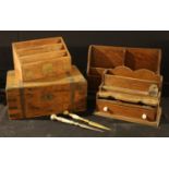 A Victorian mahogany brass bound writing slope, 35cm wide; an oak stationary rack; an oak desk stand