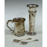 A George V hallmarked silver vase, Sheffield 1923, 169g; an Elizabeth II hallmarked silver mug