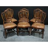 A set of six Hepplewhite style mahogany dining chairs, shield shaped back with carved splats, drop-