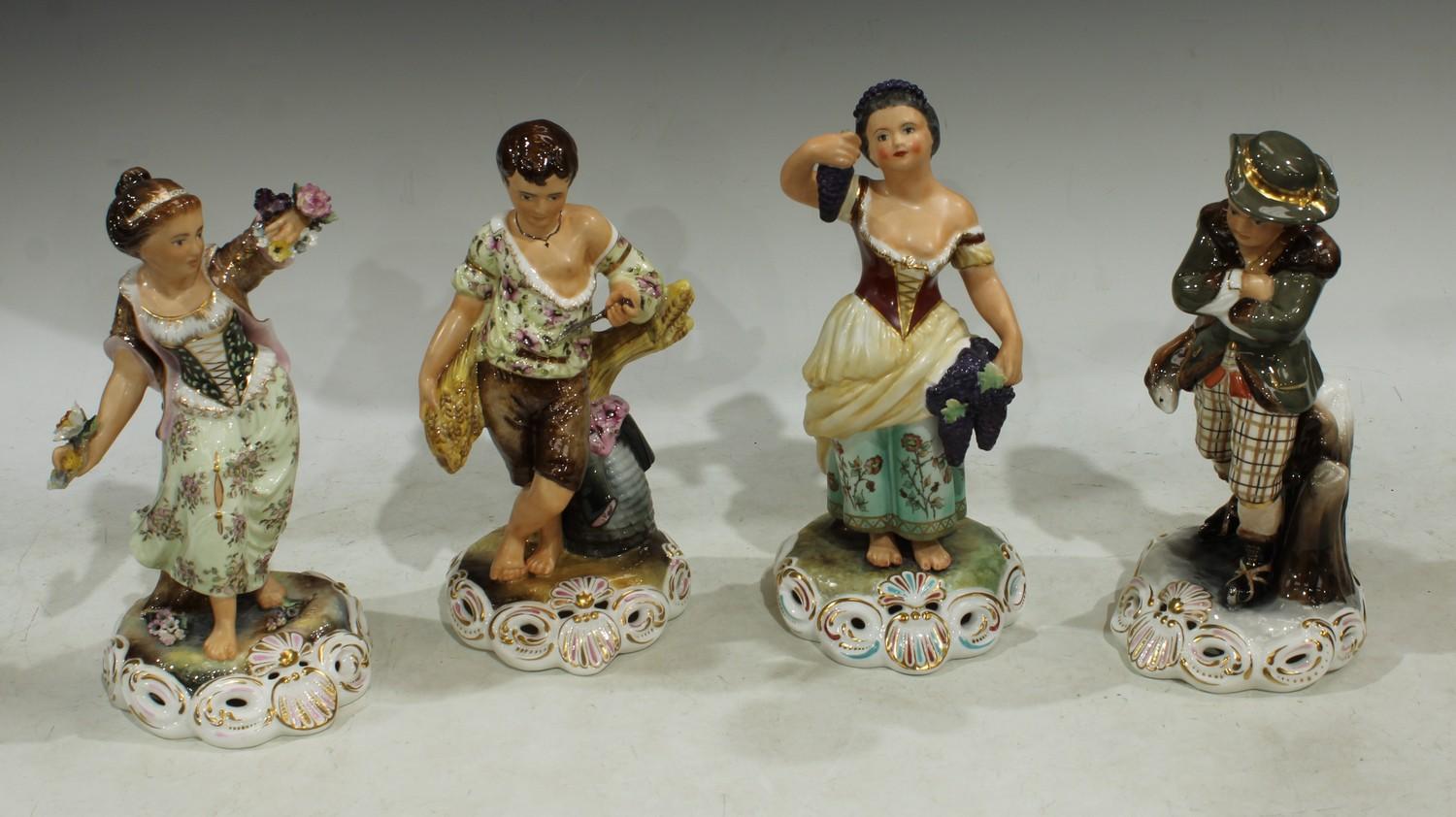 A set of four Royal Crown Derby figures, The Seasons, the tallest 25cm, printed marks, each signed