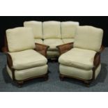 A Queen Anne style mahogany bergere drawing room suite, comprising a three seater and two single